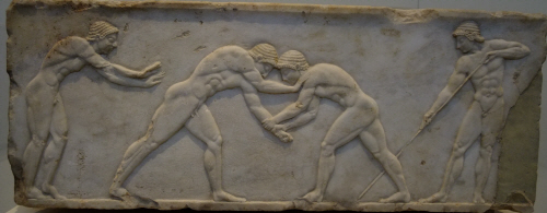 Flat Greek sculpture showing origin of wrestling