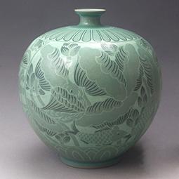 Porcelain Jar Inlaid with Celadon Green Lotus Design