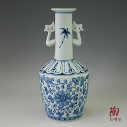 White Porcelain Vase with Blue Arabesque Design
