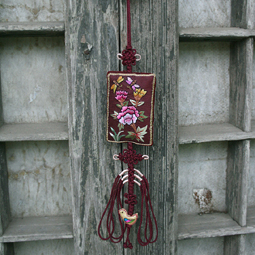 Decorative Macrame Pendant with Embroidered Wild Flowers